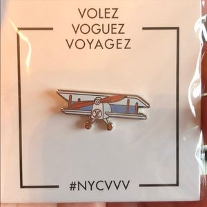 Louis Vuitton’s plane pin